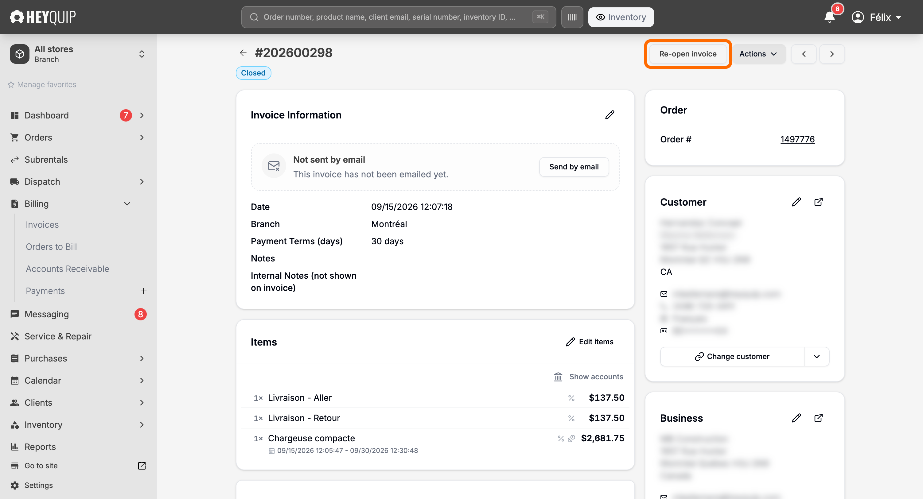 A closed invoice's header with the Re-open invoice button next to Actions